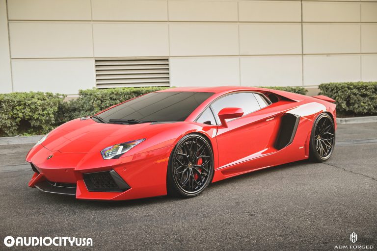 Lamborghini Aventador on the ADM Forged PF301 with Gloss Black center and lip with Red hardware.